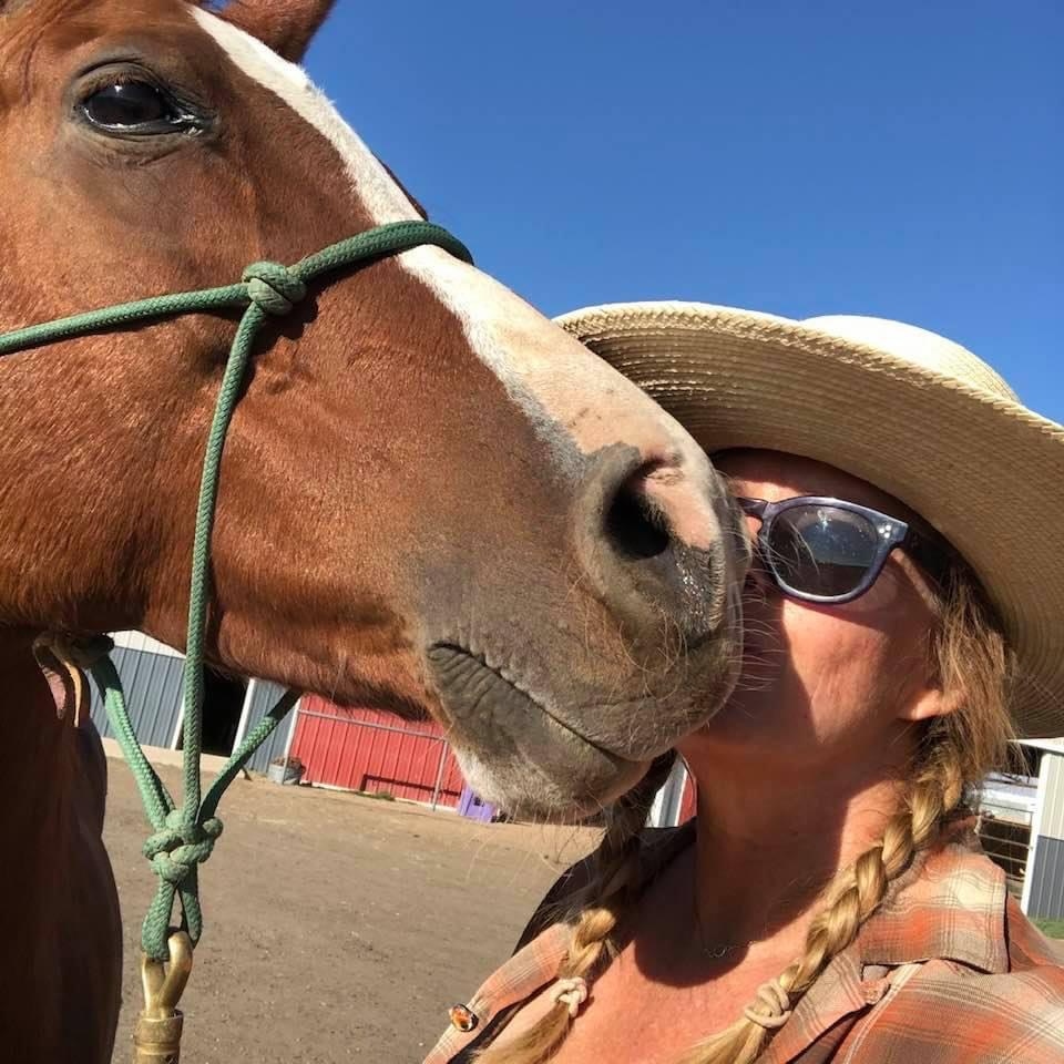 Ashley and Reesh sharing a moment at the barn